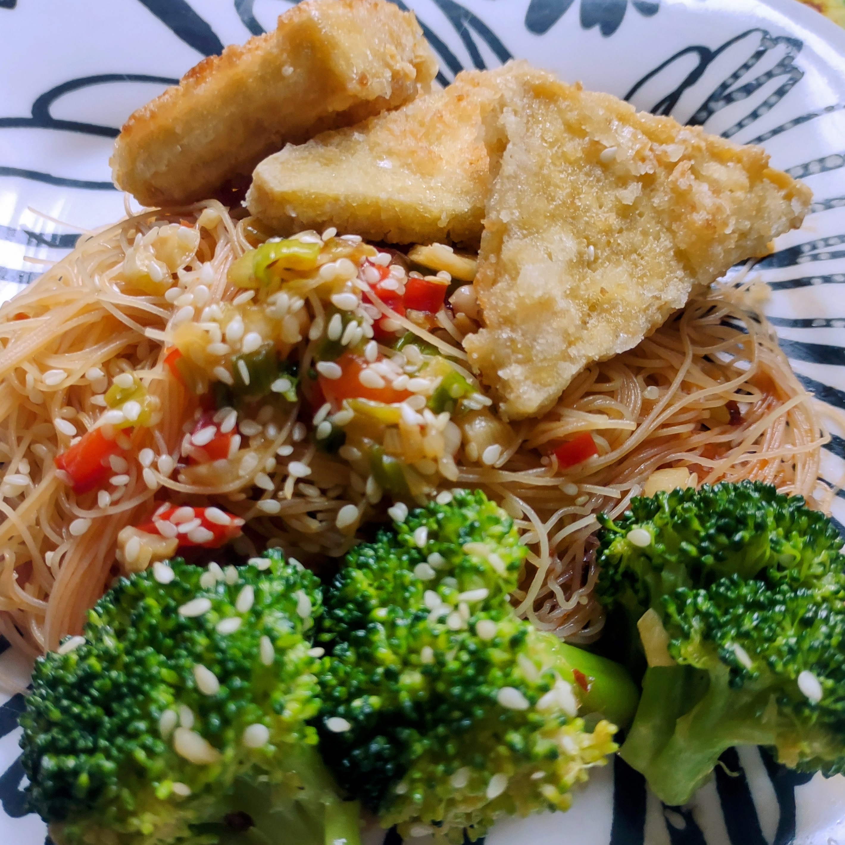 Golden brown crispy tofu triangles.